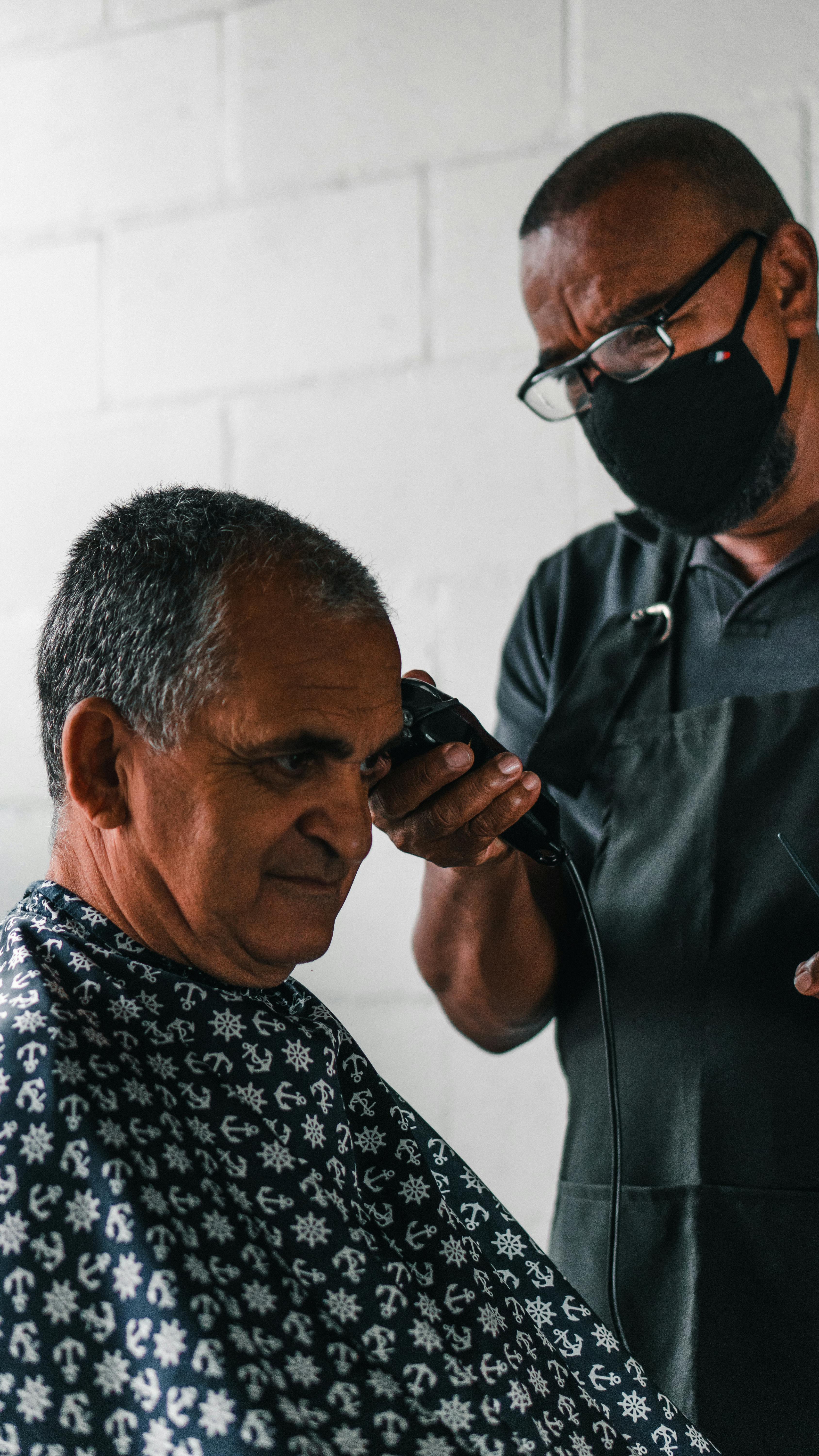 Elderly Man Getting a Haircut