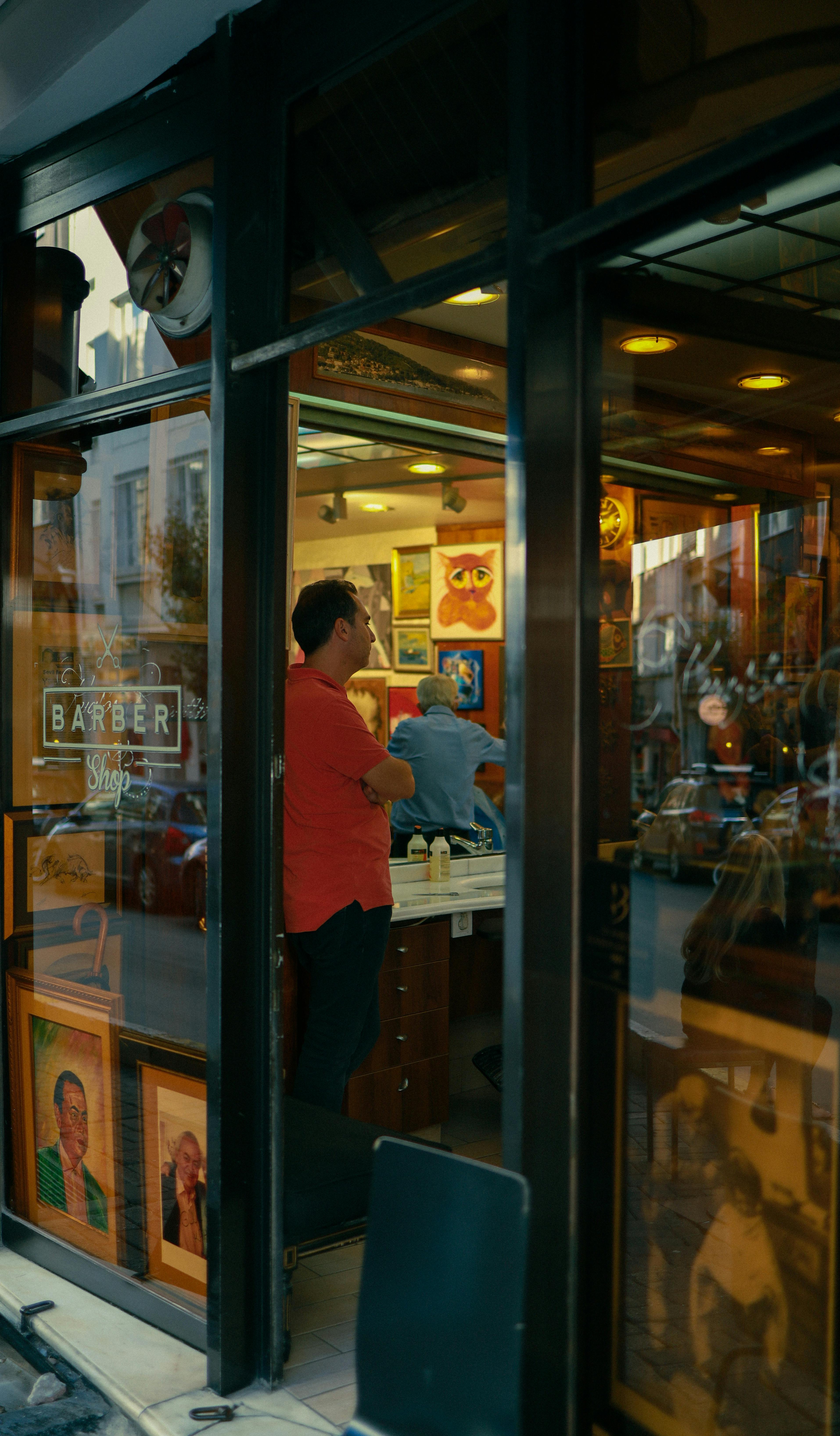 Man Standing in Barber Shop